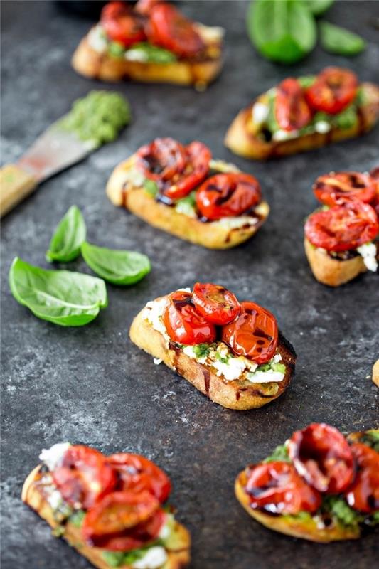 bruschetta z pečených cherry paradajok, bazalkové pesto s mandľami a kozím syrom